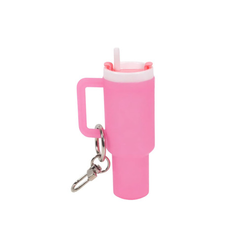 A pink mini tumbler keyring with a handle and a straw, featuring a keychain attachment.