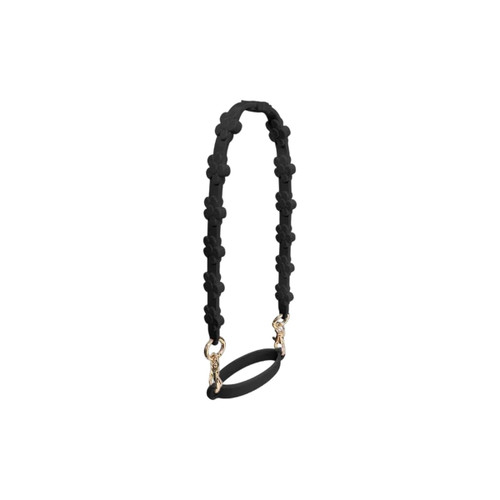 A drink bottle strap in black silicone with flower details and gold clips. Suitable for carrying tumblers easily.