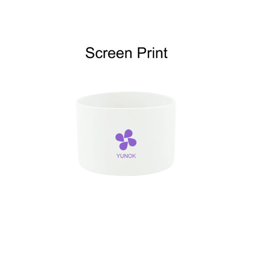 A white silicone boot for a tumbler with a purple logo on the front.