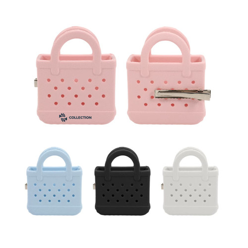 A pink, blue, black, and grey mini EVA bag clip with holes, featuring a handle and a metallic clip.