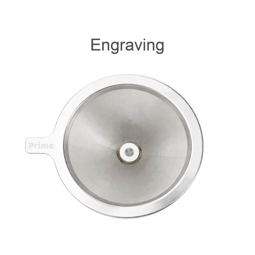 A stainless steel coffee filter with a stand, featuring a circular design and a small hole in the centre.