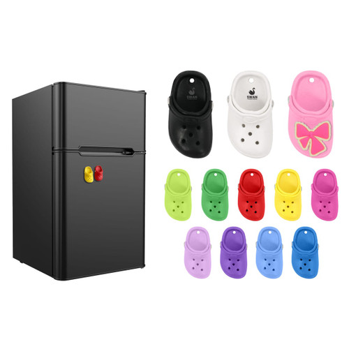 Clog shoe fridge magnets in various colours including black, white, pink, red, purple, and yellow, attached to a fridge.