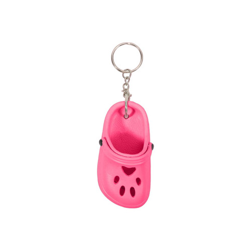 A pink paw shape clog shoe keyring attached to a silver keychain. The keyring features holes and a rounded design.