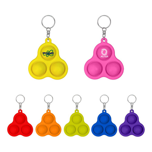 A trio of bubble-popping keychains in yellow, pink, orange, green, blue, and purple, each with a keyring attachment.