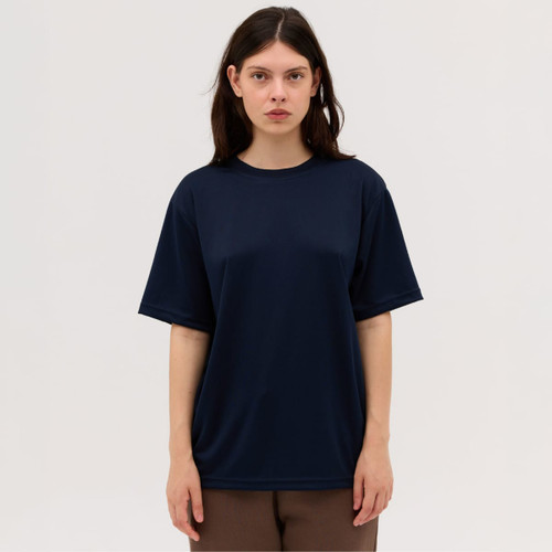 A navy blue T-shirt with a loose fit, featuring short sleeves and a round neckline, displayed on a model.