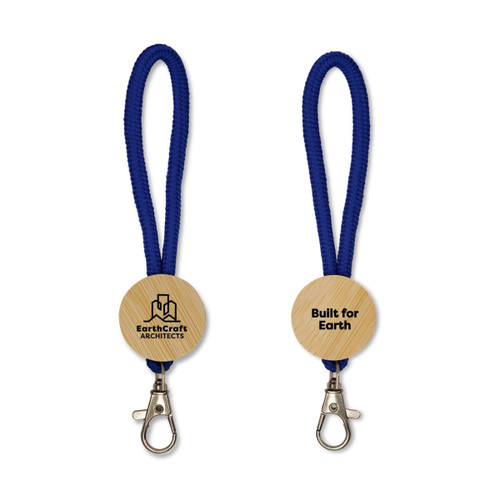 A wooden keytag with a blue fabric strap and a metal clip, featuring a branding logo on one side.