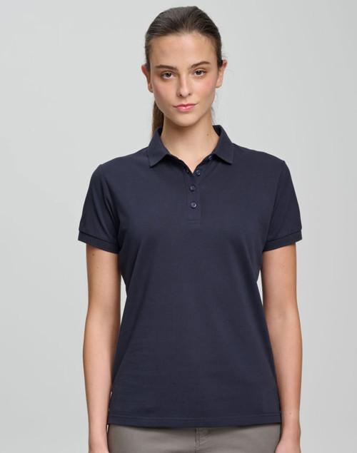 A navy blue ladies' polo shirt made from ultrafine cotton pique with a collar and button placket. It features a logo.