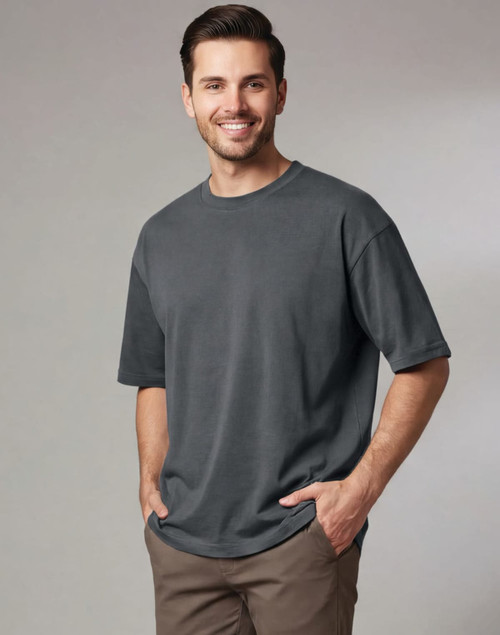 A unisex heavy cotton oversized tee in slate grey, featuring a relaxed fit and short sleeves, with a logo present.