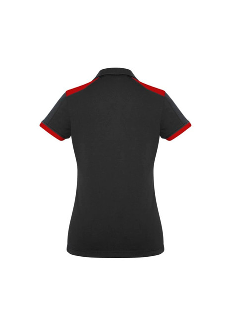 A black women's polo shirt featuring red accents on the collar and sleeves. Brand logo is visible.