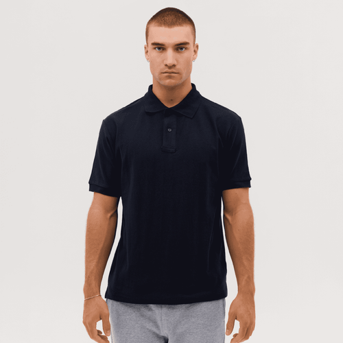 A navy polo shirt with a collar and short sleeves, featuring a logo on the chest.