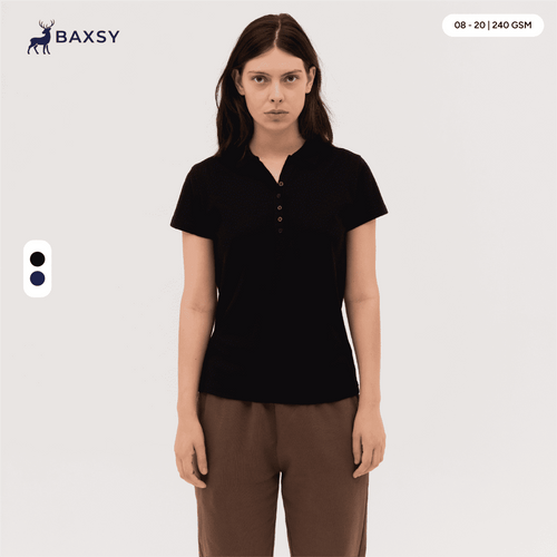 A black women's polo shirt with a buttoned collar displayed on a model, featuring a logo.