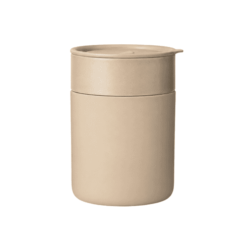 A ceramic coffee cup in a neutral beige colour, featuring a matching lid and a simple design. It has a logo on the surface.