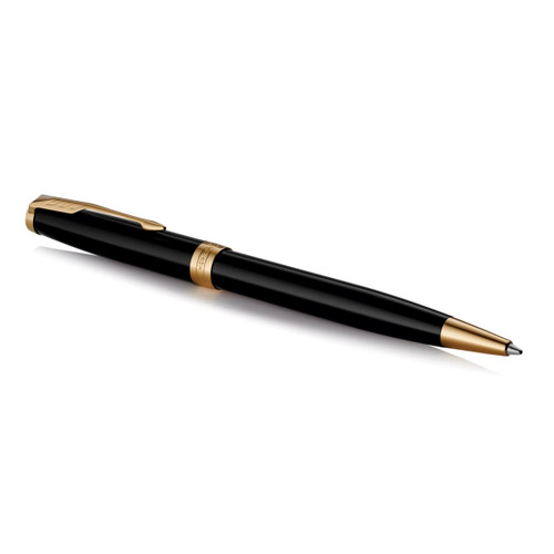 A black ballpoint pen with gold accents and a sleek design. The pen features a logo and is elegantly styled.