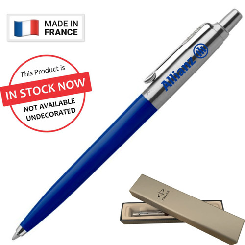 A metal ballpoint pen in navy blue, presented in a gold box, featuring a logo and a clip design.