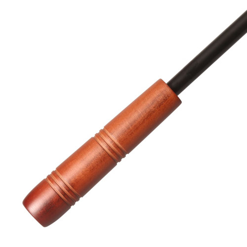 A wooden handle of a black umbrella, featuring ridged detailing for grip.