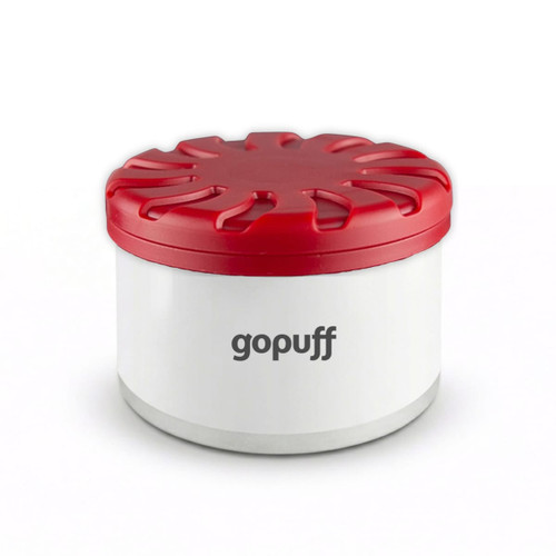 A round air freshener container with a red lid and white base, featuring a logo.