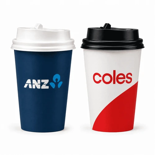 Two single-walled paper cups, one navy blue with a logo and one white with red accents, featuring branding.