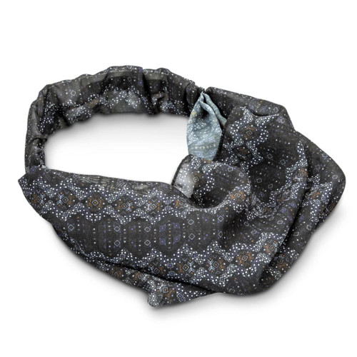 A custom elastic headband in a black and grey pattern with intricate designs and a versatile shape.