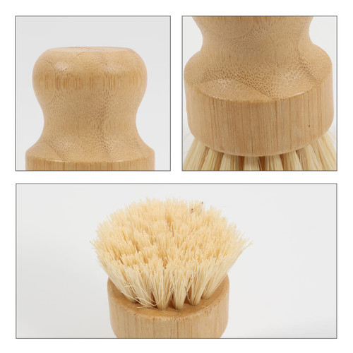 A bamboo kitchen dish brush featuring a wooden handle and bristles, with a natural finish and a rounded design.