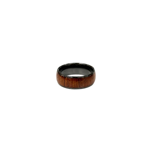 A NFC ceramic ring featuring a polished black interior and a rich brown wooden exterior. It has a logo visible.
