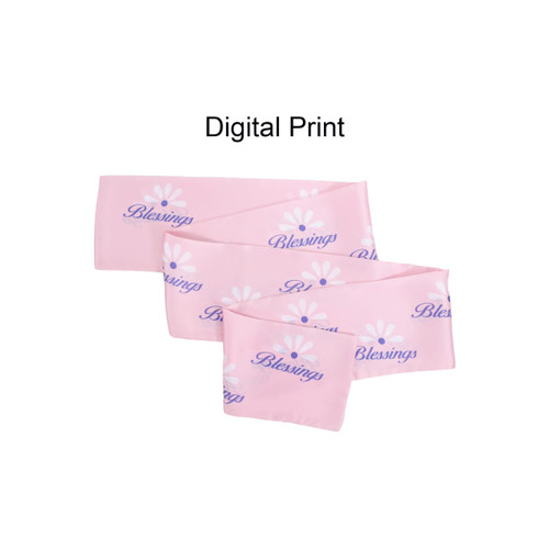 A pink chiffon long scarf featuring a digital print with floral designs and the word "Blessings." It has a logo.