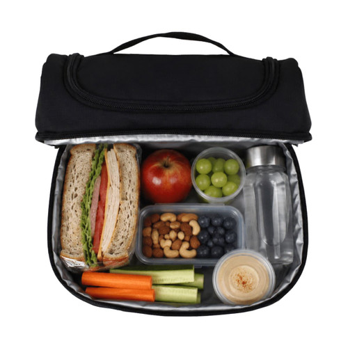 A black lunch bag containing a sandwich, apple, grapes, carrot sticks, celery, nuts, blueberries, hummus, and a drink bottle.