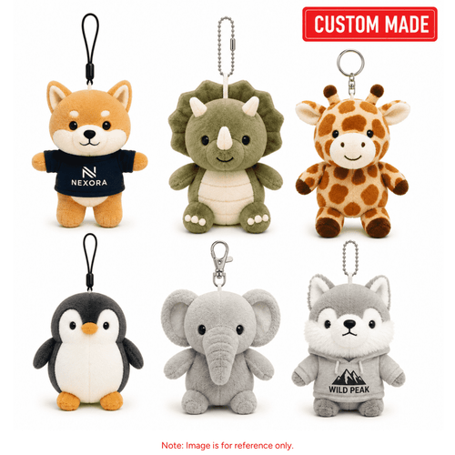 A selection of six cute plush animal keyrings, including a penguin, elephant, giraffe, and wolf, in various colours.