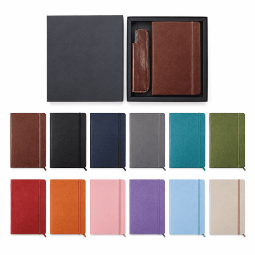 A signature soft cover notebook gift set in various colours, including a matching pen pouch, presented in a black box.