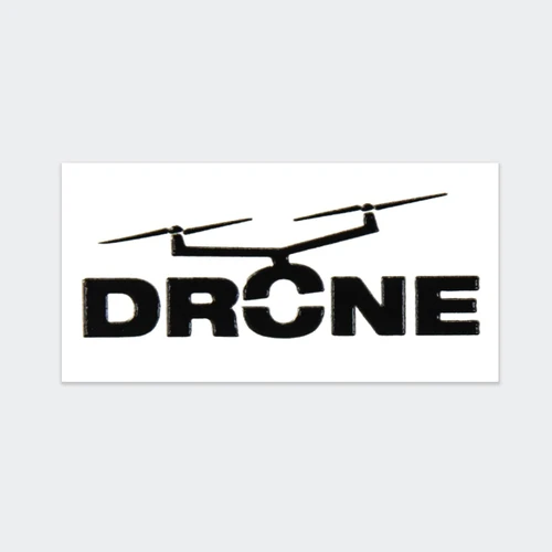 A black sticker featuring a silhouette of a drone above the word "DRONE" in bold letters.