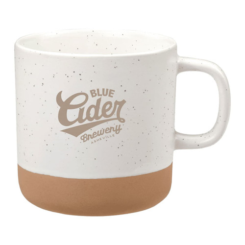 A ceramic coffee mug with a speckled white finish and a brown base, featuring a logo.