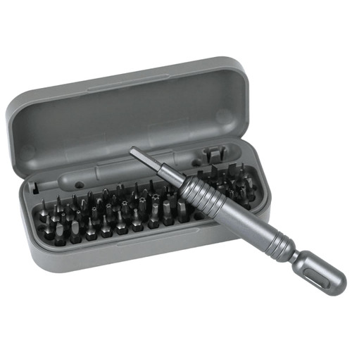 A grey pocket screwdriver tool set with a variety of bits inside a compact case. Includes a screwdriver handle.