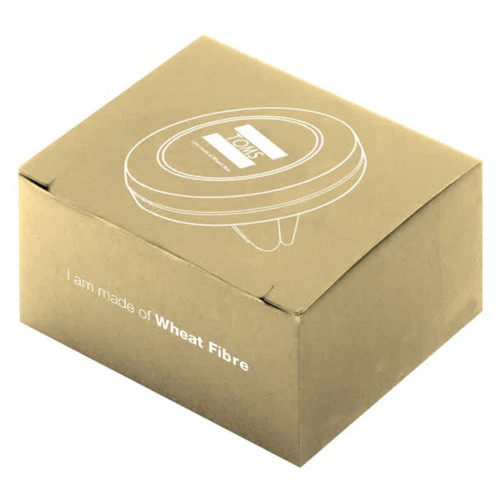 A round, silver car vent mount in a cardboard box made of wheat fibre, featuring a simple logo design.