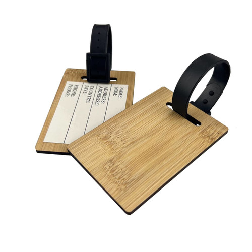 A bamboo luggage tag with a black strap, featuring a blank area for personal information.
