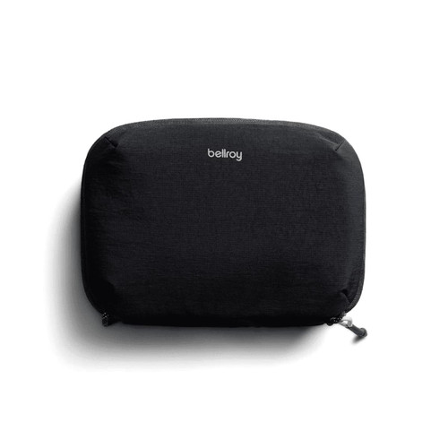 A black tech kit with a zip closure and a logo on the front, featuring a sleek, minimalist design.