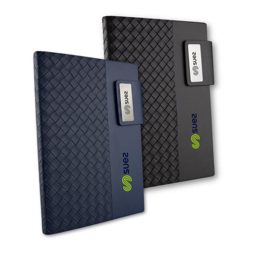 A pair of Nexus Notebooks in navy and black, featuring a textured cover and a branded logo.