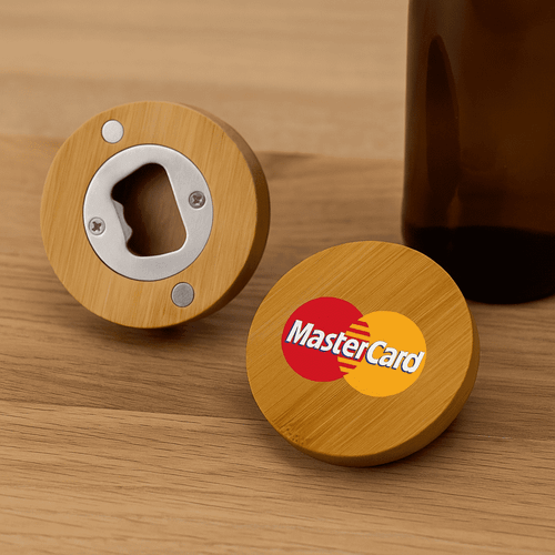 A round bamboo bottle opener in natural wood with a silver metal opener and a branding logo on one side.