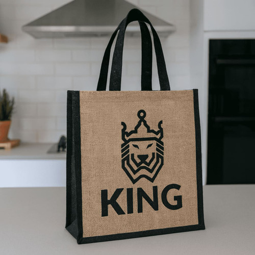 A jute tote bag in natural and black, featuring a logo and sturdy handles.