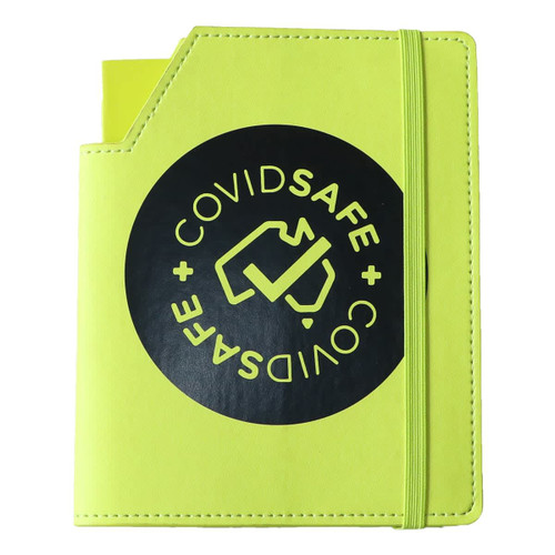 A bright yellow leatherette notebook with an elastic band and a logo on the cover.