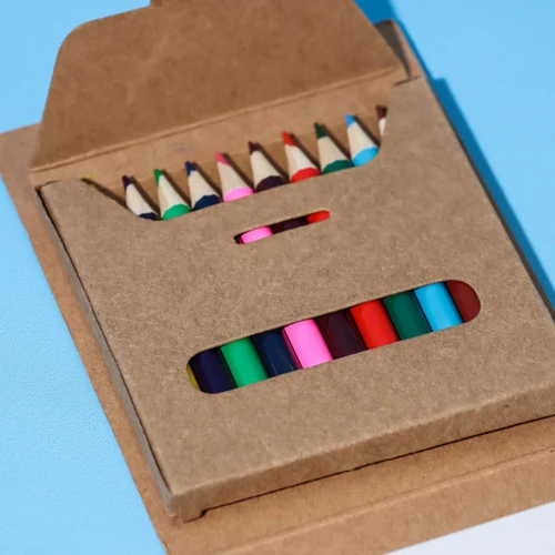 A notepad set featuring a brown cardboard case containing assorted coloured pencils in various hues.