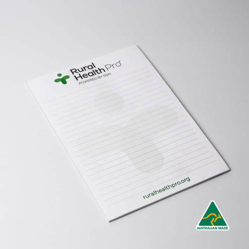 A5 notepad with 25 leaves, featuring a green logo, white background, and lined pages. Australian made.