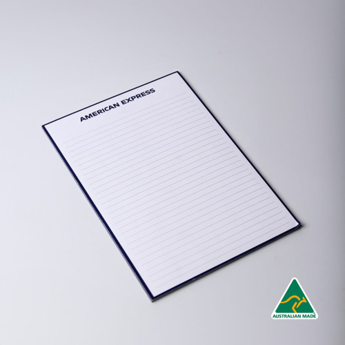 A5 note pad in navy blue with lined pages and a logo in the corner. Contains 50 leaves.