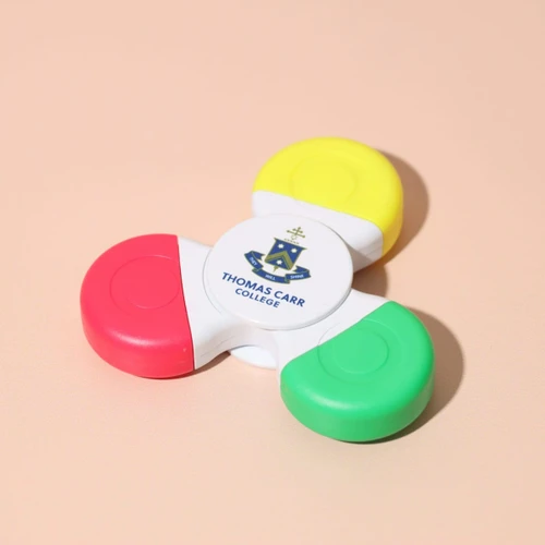 A Fiddle Spinner Highlighter featuring yellow, red, green, and a central white section with a logo.