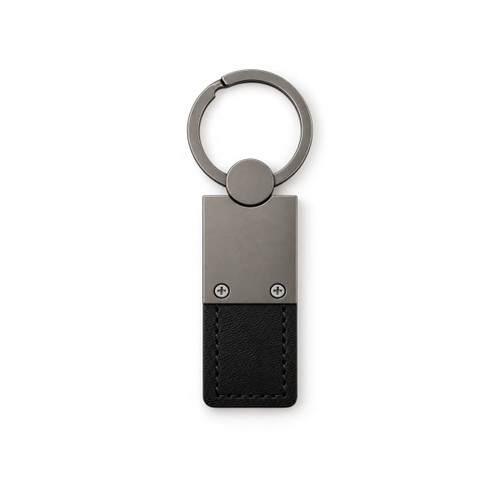 A metal keytag with a rectangular black leather strap and a circular keyring attachment.