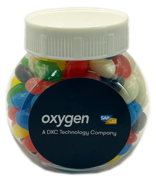 A plastic jar filled with colourful mini jelly beans, featuring a white lid and a logo on the front.