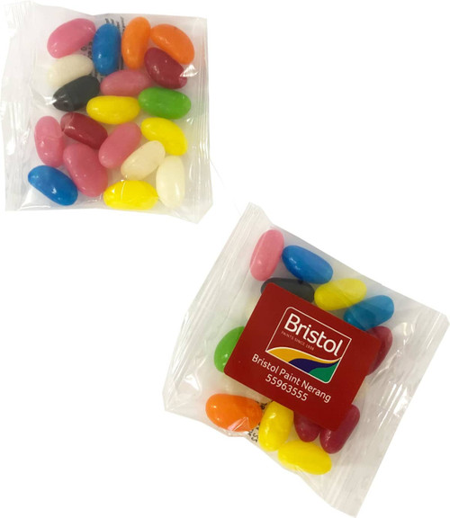 A packaging of assorted jelly beans in various colours, featuring a logo on one of the bags.