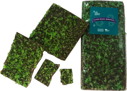 Premium Chocolate Peppermint Crystals in green and dark brown packaging, featuring pieces of peppermint chocolate.