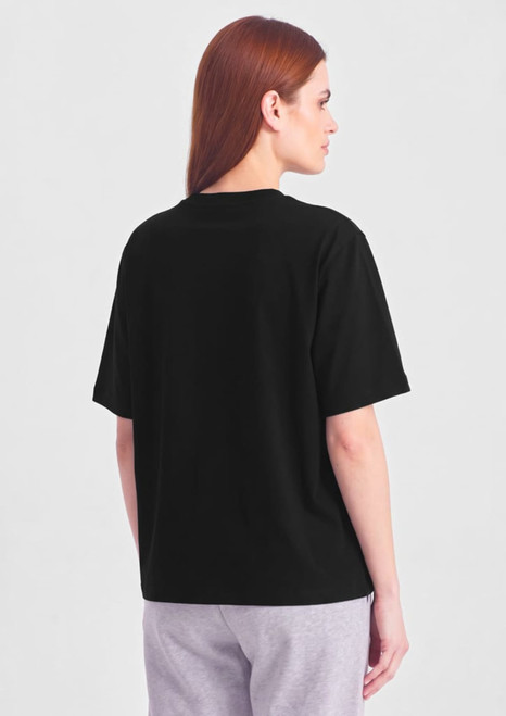 A black box tee is displayed, featuring a relaxed fit and short sleeves. The model is shown from the back.