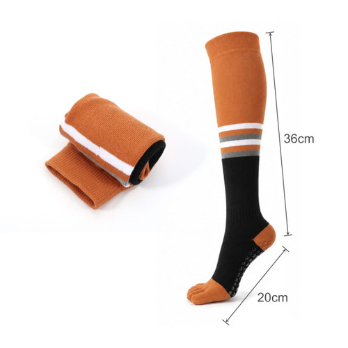 Knee-high custom toe socks in orange and black with white stripes, featuring grip dots on the sole.