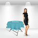A round table cover in turquoise with a floral design, featuring a logo, displayed next to a model in a black dress.
