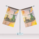 A desk flag display featuring two flags with a windmill design, mounted on a silver pole with a circular base.